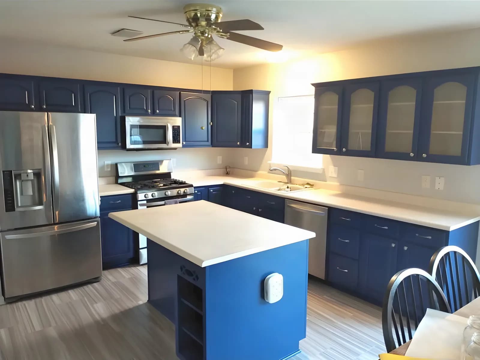 Oak cabinets painted navy, island included